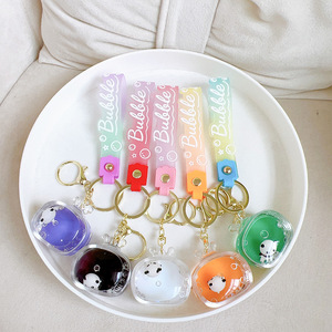 Xinxing Cute 3D Doll Pendant Flowing Sand Gift Oil Filling Floating Claw Machine Acrylic Liquid Oil Filling TV <strong>Panda</strong> Keychain