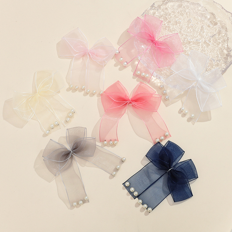 7.Maille transparente avec ornements de perles