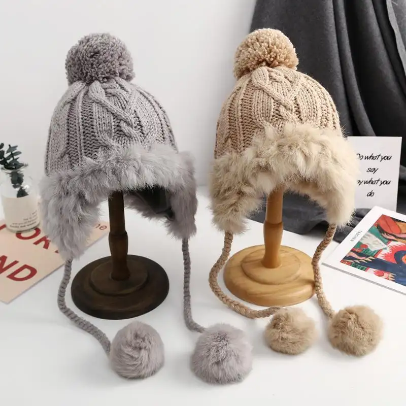 Pelliccia di coniglio paraorecchie foderato in velluto cappelli invernali da donna lavorati a maglia caldi cappelli coreani dolci carini paraorecchie invernali cappelli lavorati a maglia con Pom Pom