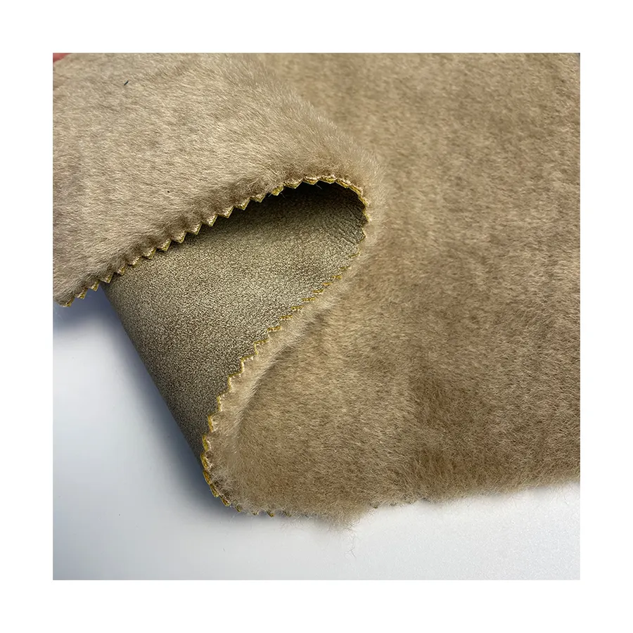 Tela de piel sintética unida de PU con patrón de diseño personalizado por el fabricante de China Material de poliéster popular para tapicería de sofá de ropa