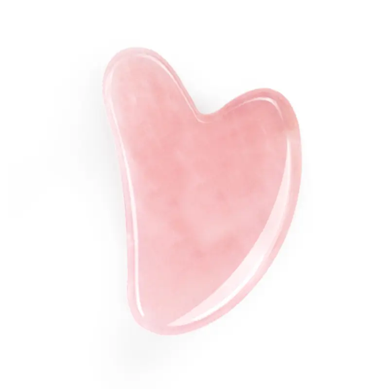 Un livello A forma di cuore Gua Sha strumento pietra naturale rosa rosa quarzo giada Gua Sha per il viso raschietto