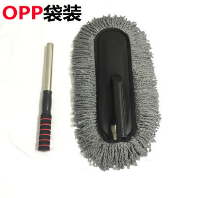 Grandes pantoufles cirées grises dans un sac OPP
