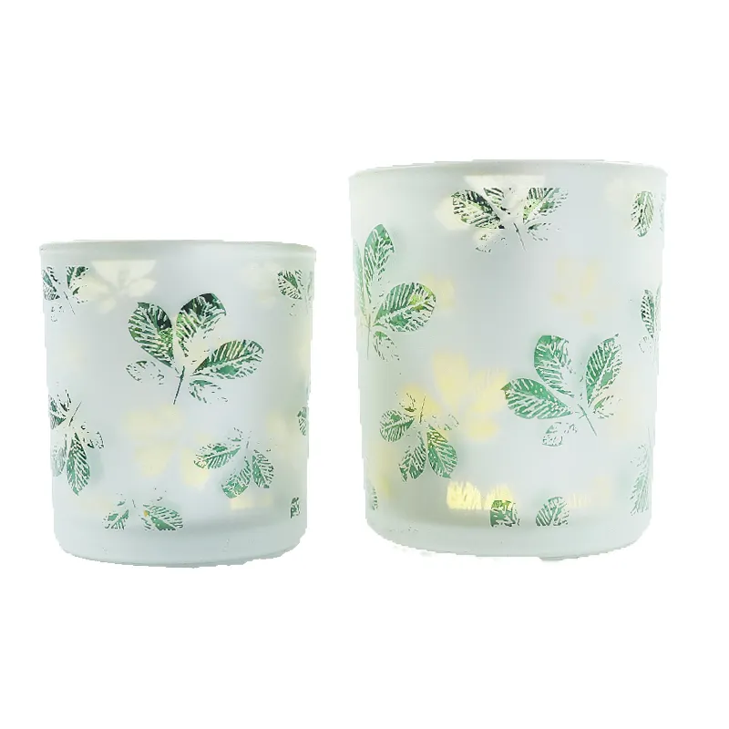 Wholesale customized frosted green color laser engrave flowers pattern glass candle jar holder with wooden lid