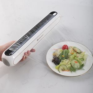 キッチン調節可能なしがみつくフィルムカッター再利用可能なプラスチック食品ラップカッターディスペンサー