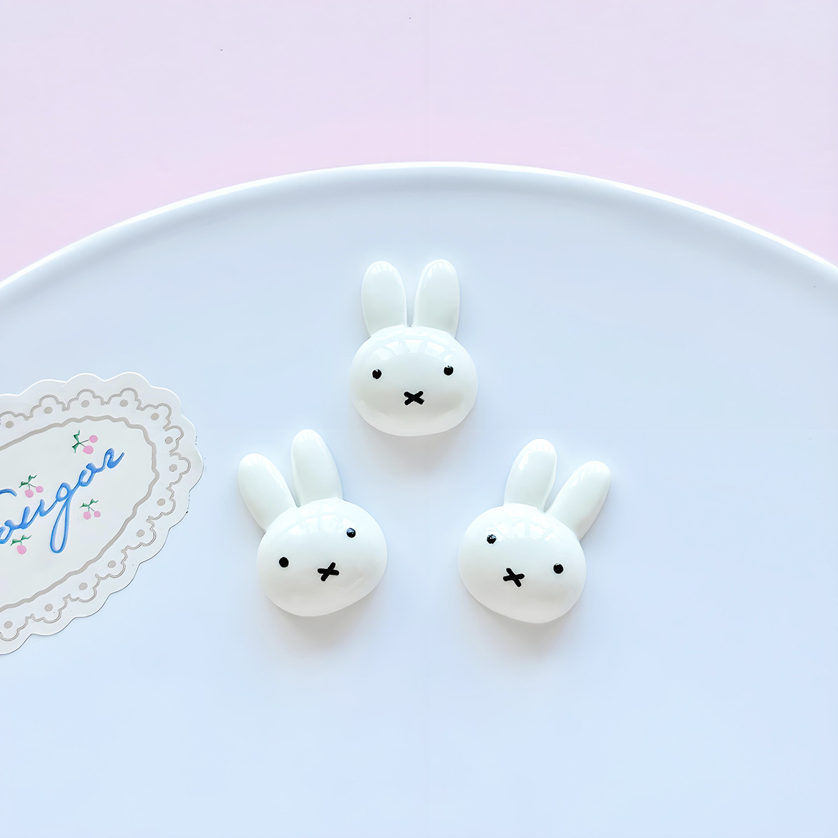 Petite tête de lapin à bouche noire 23*17mm