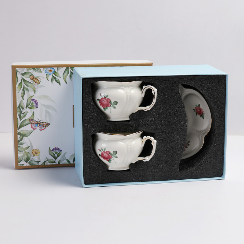 white-double cup and saucer