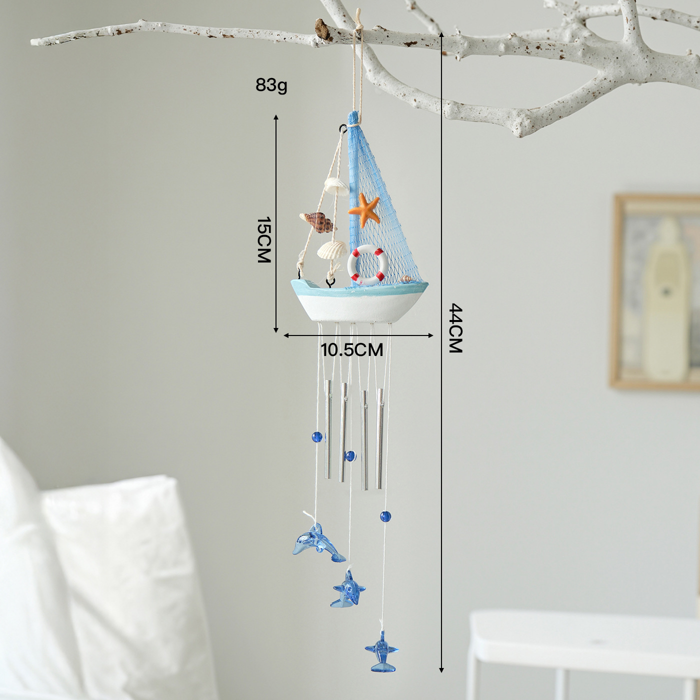 Lifebuoy, small boat, wind chimes