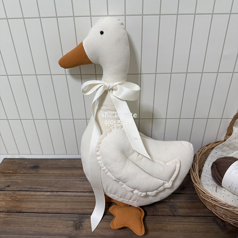 large white swan doll
