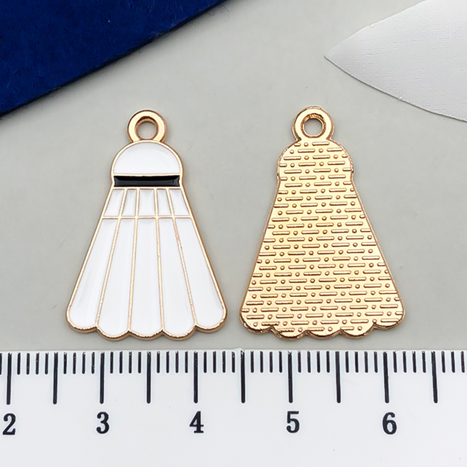1 badminton blanc 25x18mm-1.4g-21727