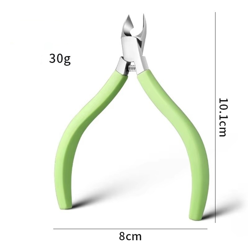 Coupe-callosités en silicone vert avec ressort intégré.