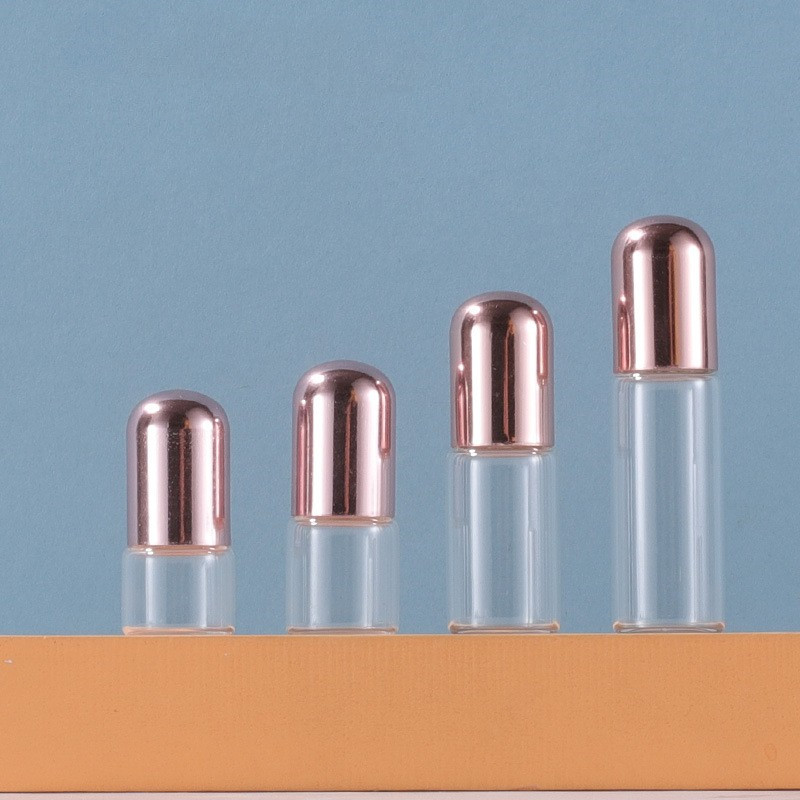 Transparent roller bottle + rose gold cap