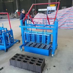 Operación manual Máquina de ladrillos de hormigón Fabricación de bloques huecos estándar de dos a cinco piezas por tiempo de ciclo - Product Image 2