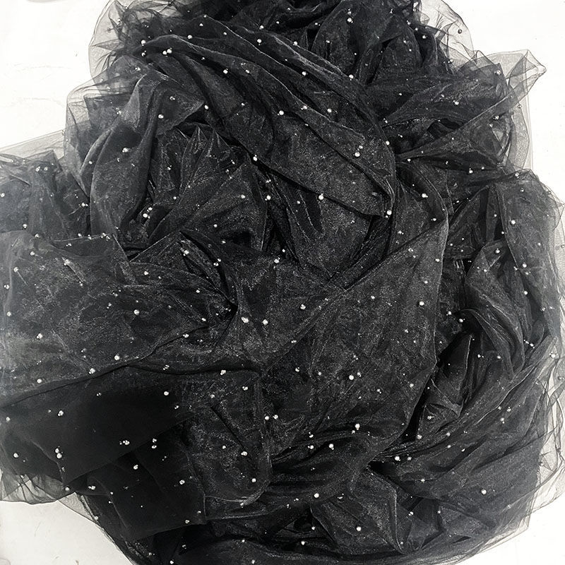 Black yarn highlight silver beads