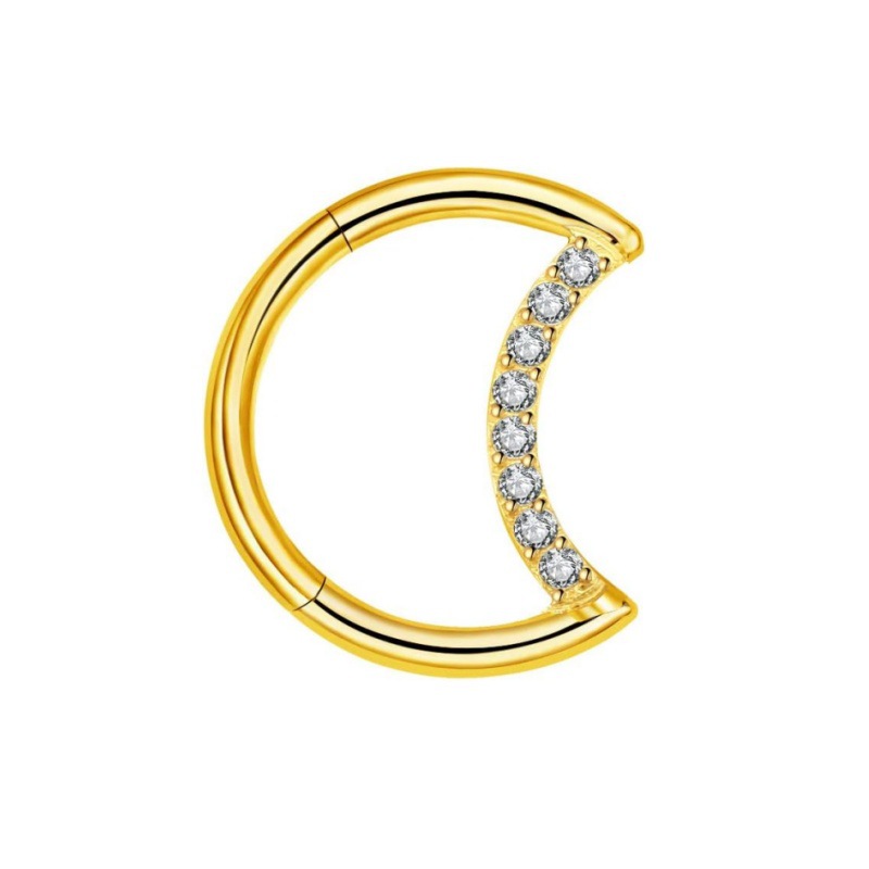 Gold inlaid with zircon