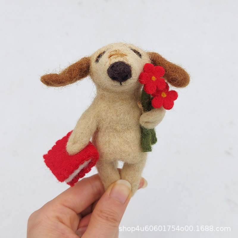 Holding a book and a flower dog