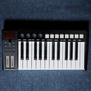 WORLDE-controlador de teclado mini midi, 25 teclas, con almohadilla de tambor, portátil