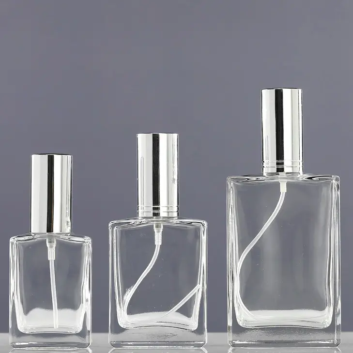 Botella de perfume de vidrio transparente, con tapa de oro y plata, pulverizador, 30ml, 50ml, 100ml, gran oferta