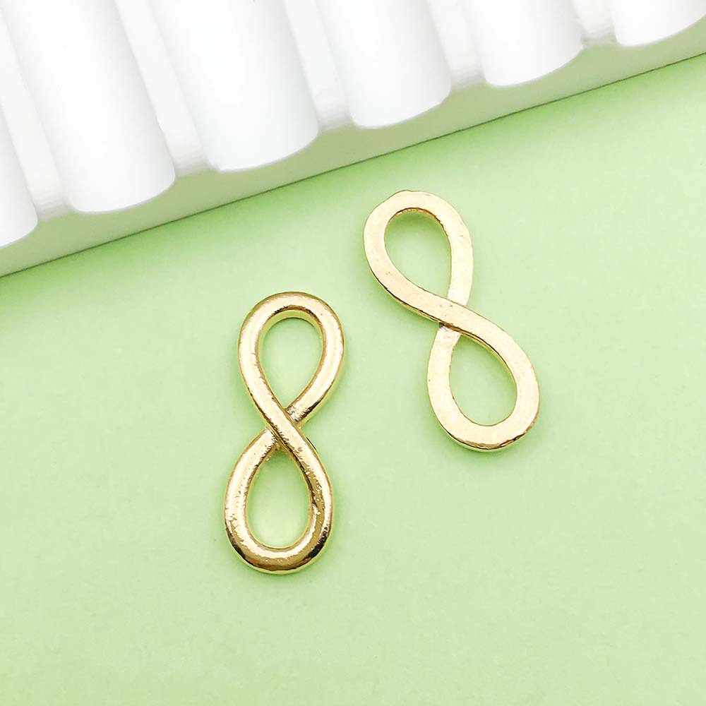 Symbole infini en or 1 KC - 1,2g - 23*8mm - 11585