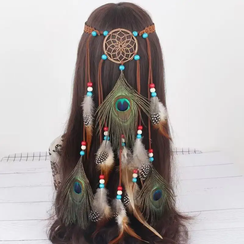 Atrapasueños pelo de pavo real cuerda de plomo tocado de captura India foto escénica