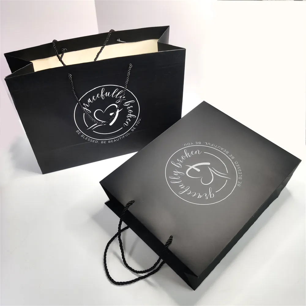 Bolsas de papel de embalaje de Kraft negro para la ropa, bolsas de cartón personalizadas con logotipo ecológico, bolsa de transporte