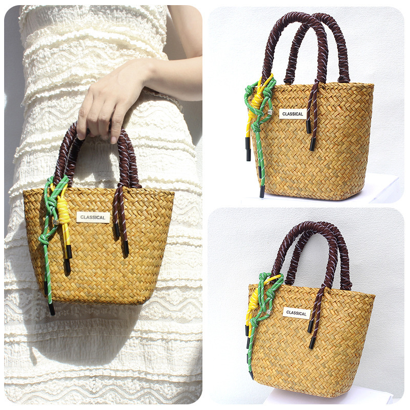Yellow bag with brown hand rope
