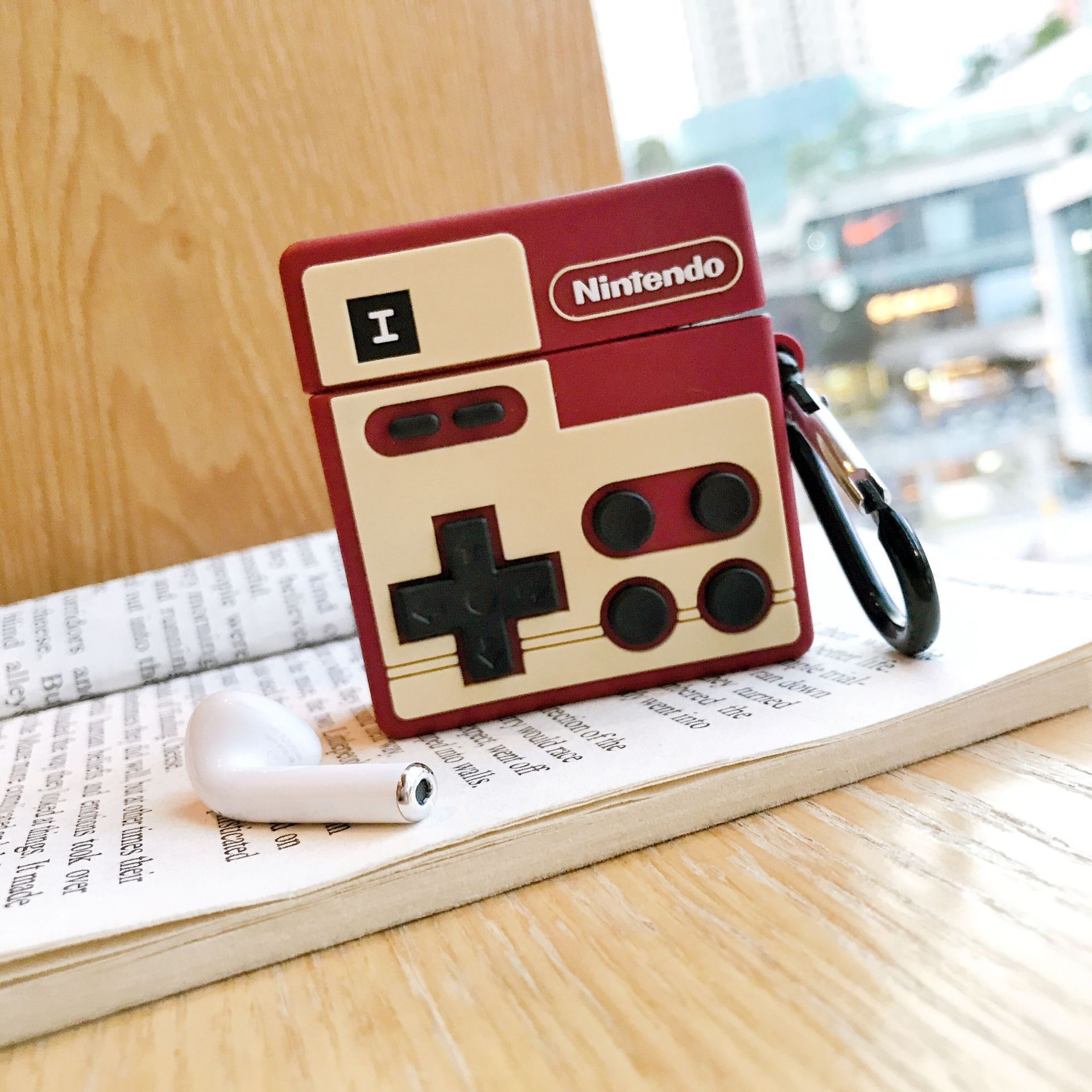 Consola de juegos roja (agujero fino)
