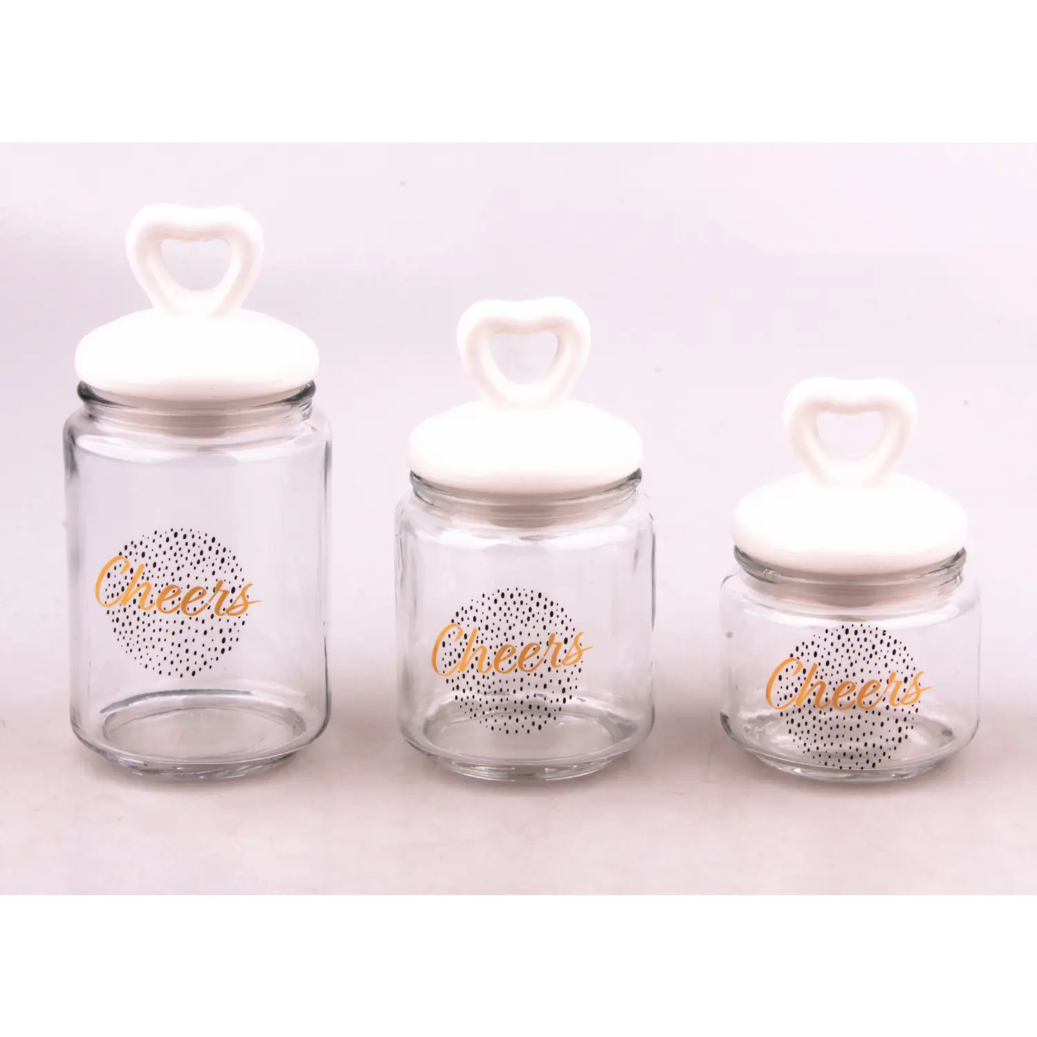 Best quality round glass candy storage canister jar food container with heart shape ceramic lid and decal for home decor