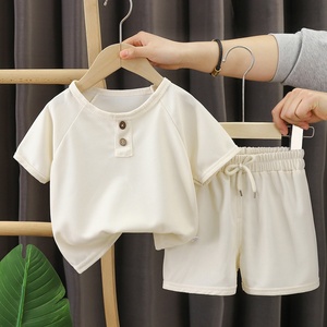 新しい夏のカジュアルな韓国風半袖男の子用スーツショーツジャージーワッフルデザイン子供服卸売り-分。注文2pcs