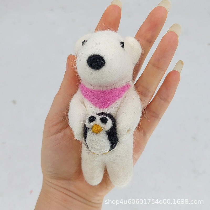 Pink crescent moon polar bear hugging a penguin