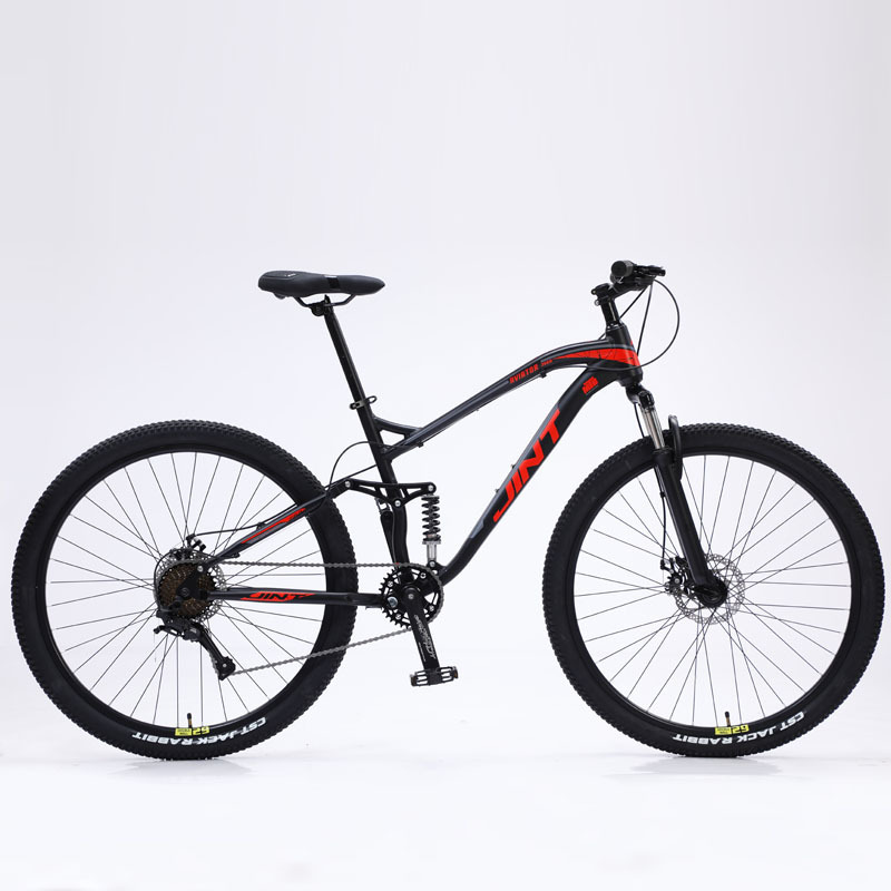 Black and red 9-speed hydraulic brakes with brown sidewall tires