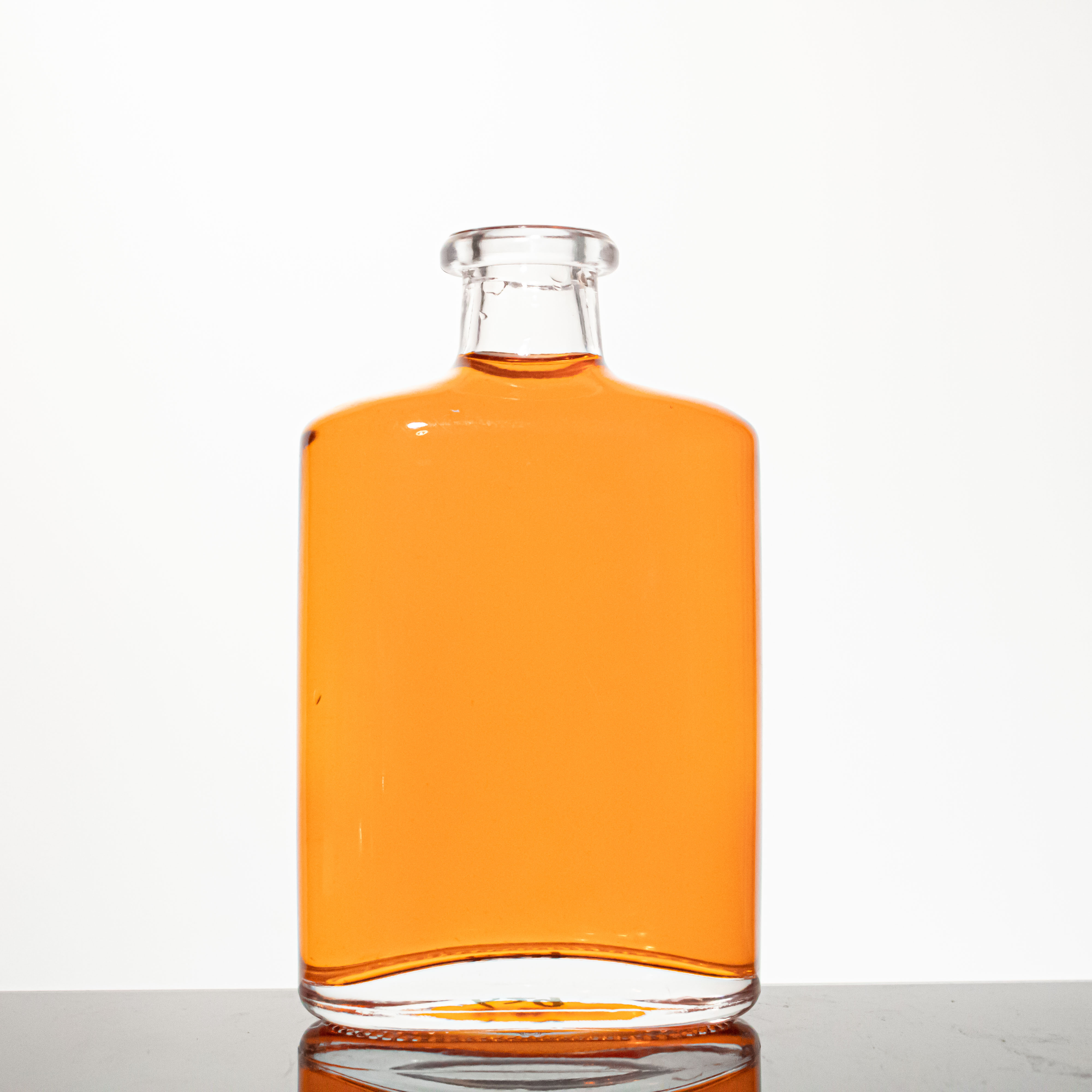 Botella de vidrio Ginebra plana