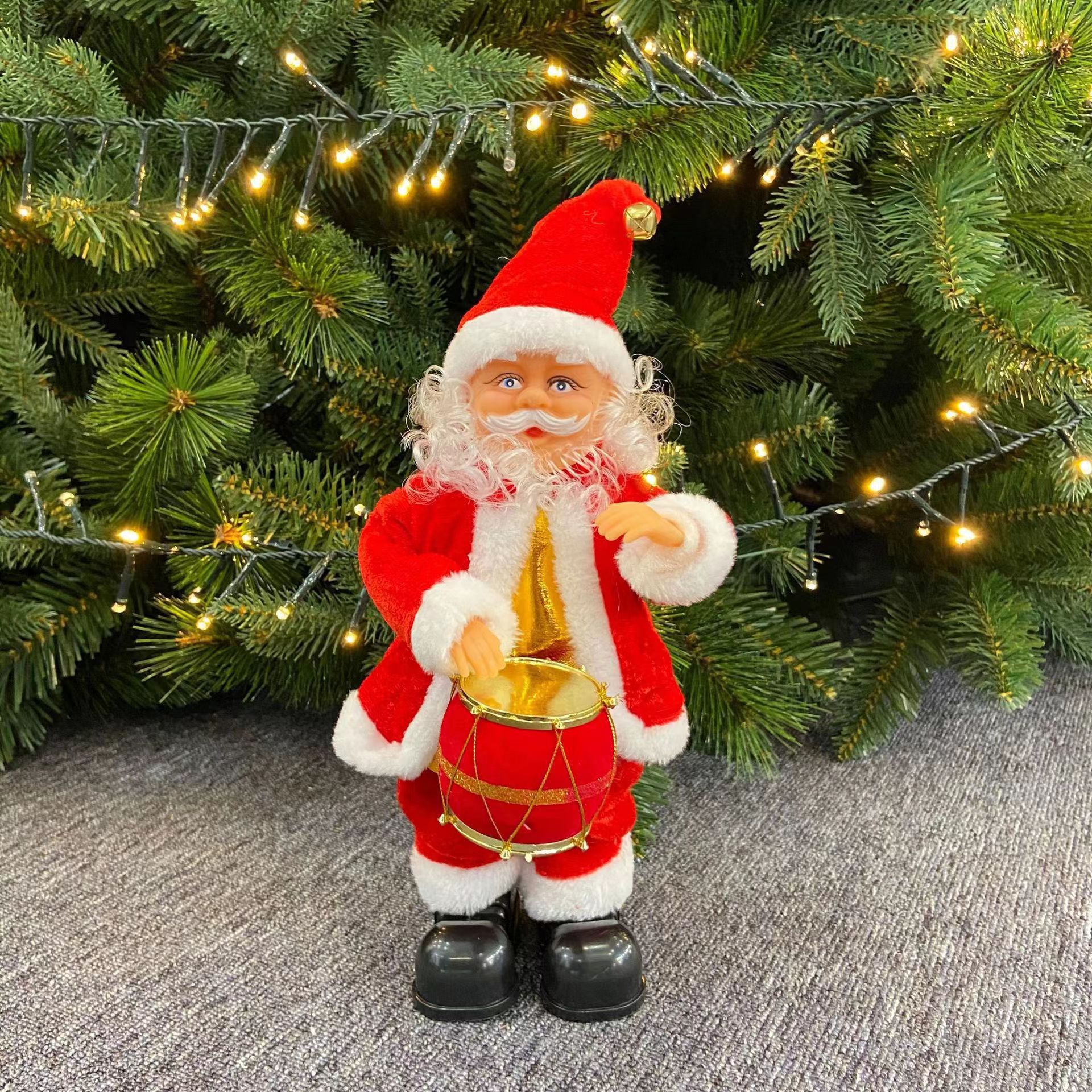 Père Noël tambourinant rouge