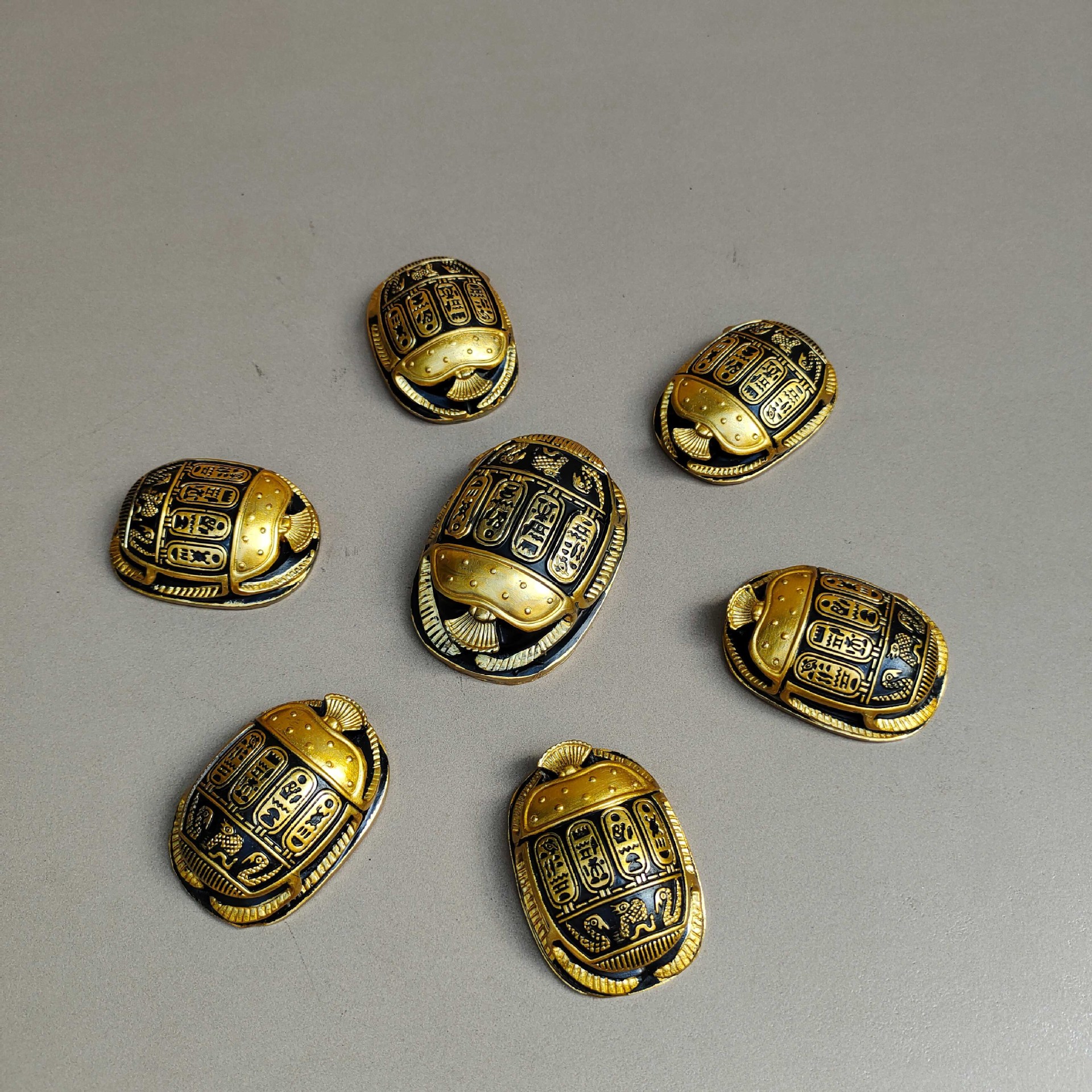 1 large 6 small scarab beetle set