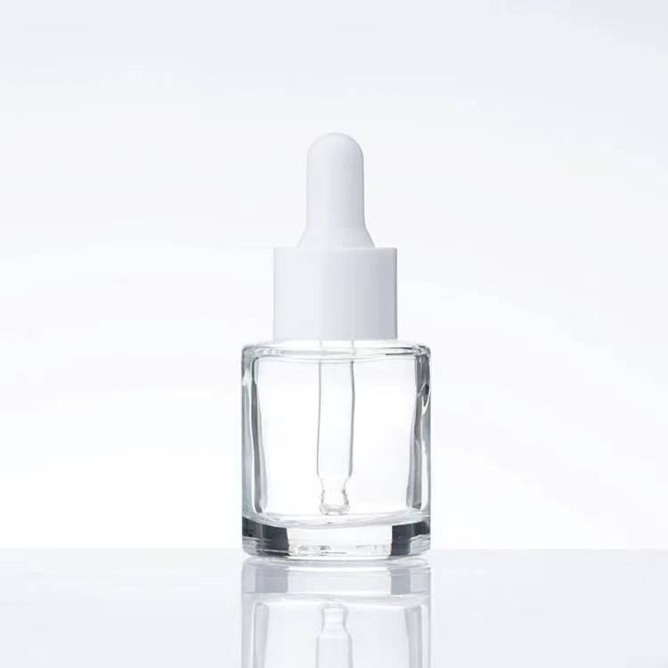clear bottle with white dropper