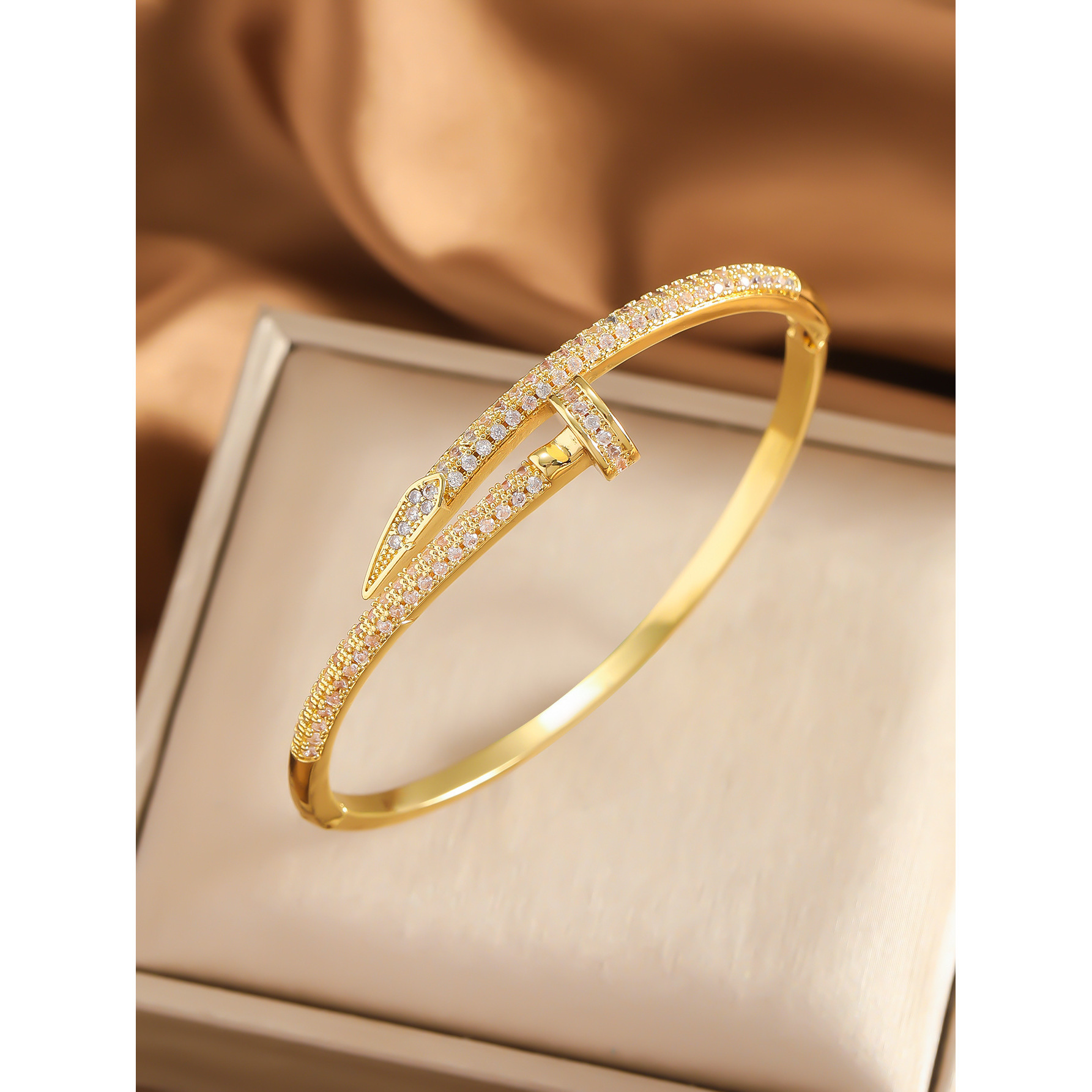 Large golden nail