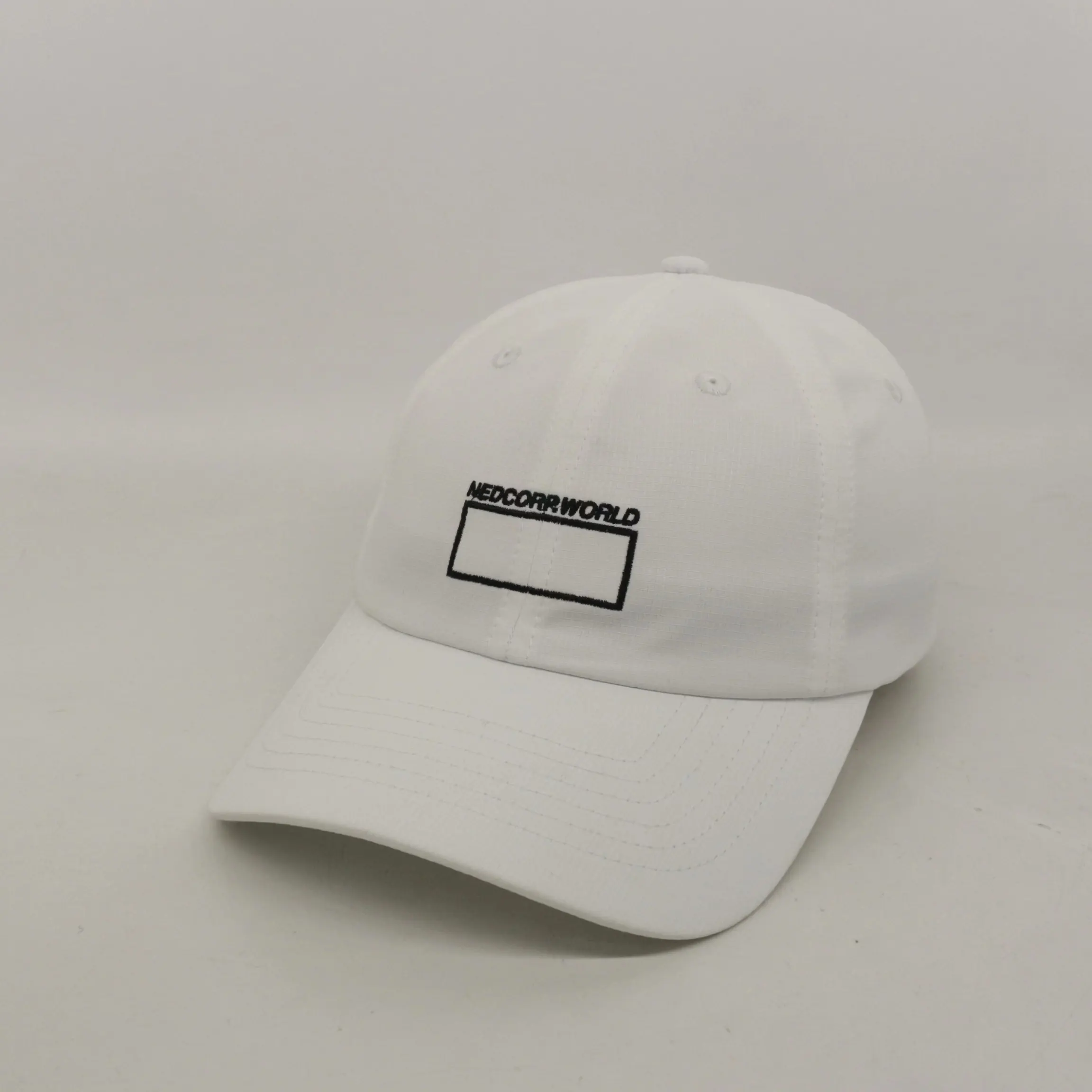 OEM fábrica proveedor sombrerero blanco bordado 6 paneles sin estructura gorra personalizada ripstop nylon deportes sombrero