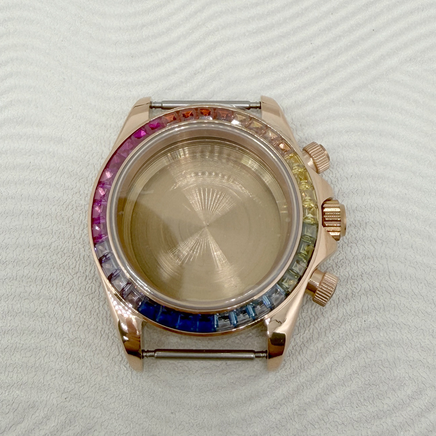 Rose gold case with colored diamonds