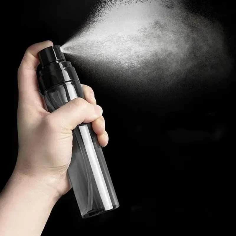 Botellas de bomba de pulverización de niebla de cilindro negro de plástico PET de 100ml botella de bomba sin aire con pulverizador de niebla fina