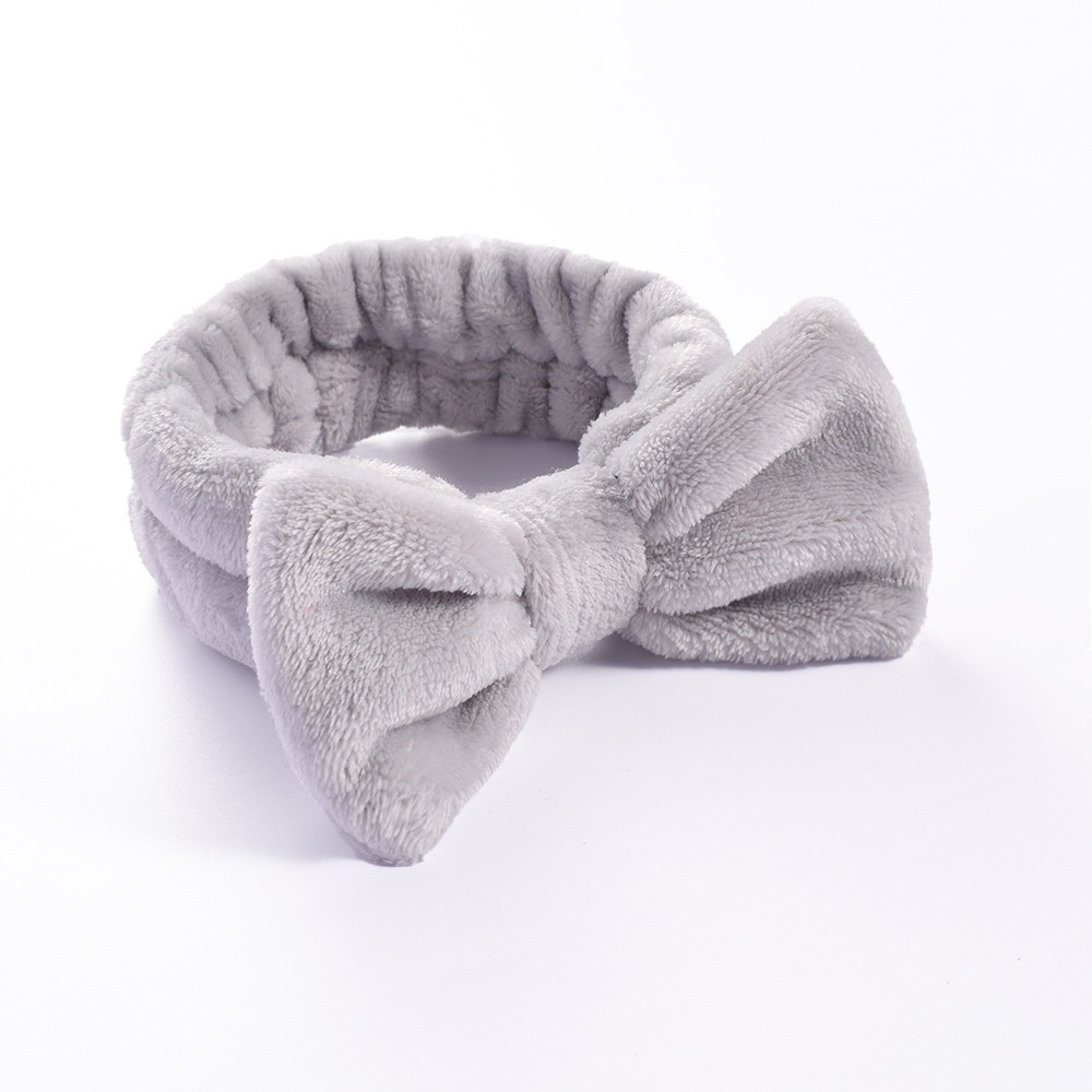 Diadema gris puro con lazo.