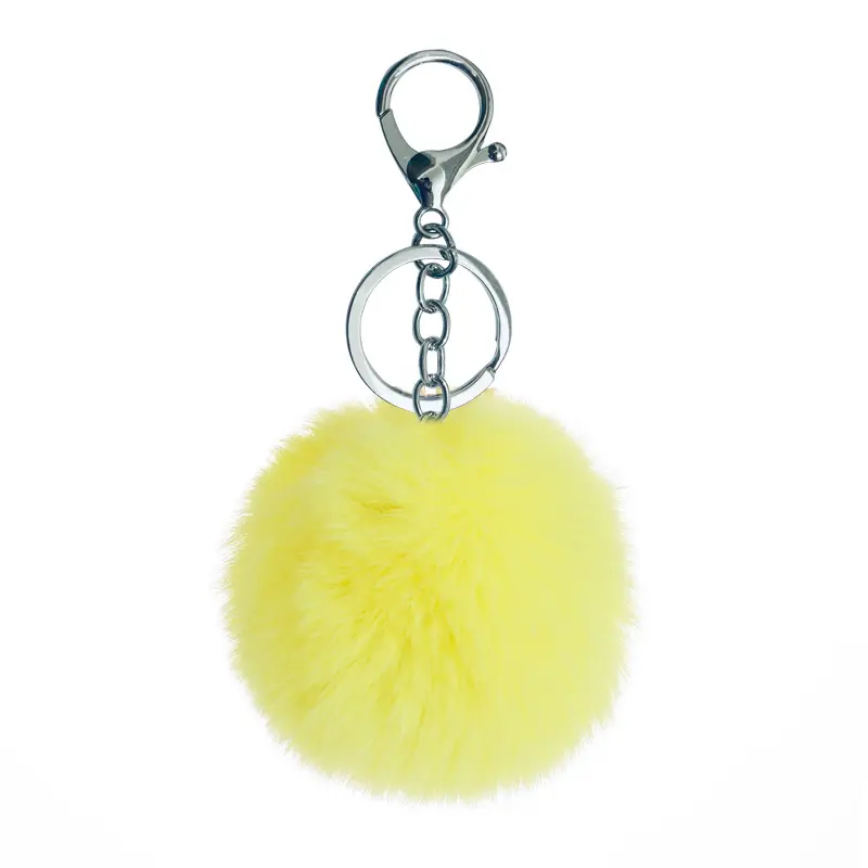 Venta al por mayor diseñador multicolor Mini en forma de corazón de conejo Faux Fox Fluffy Puff Ball llaveros de felpa de piel Pom llavero con conjunto