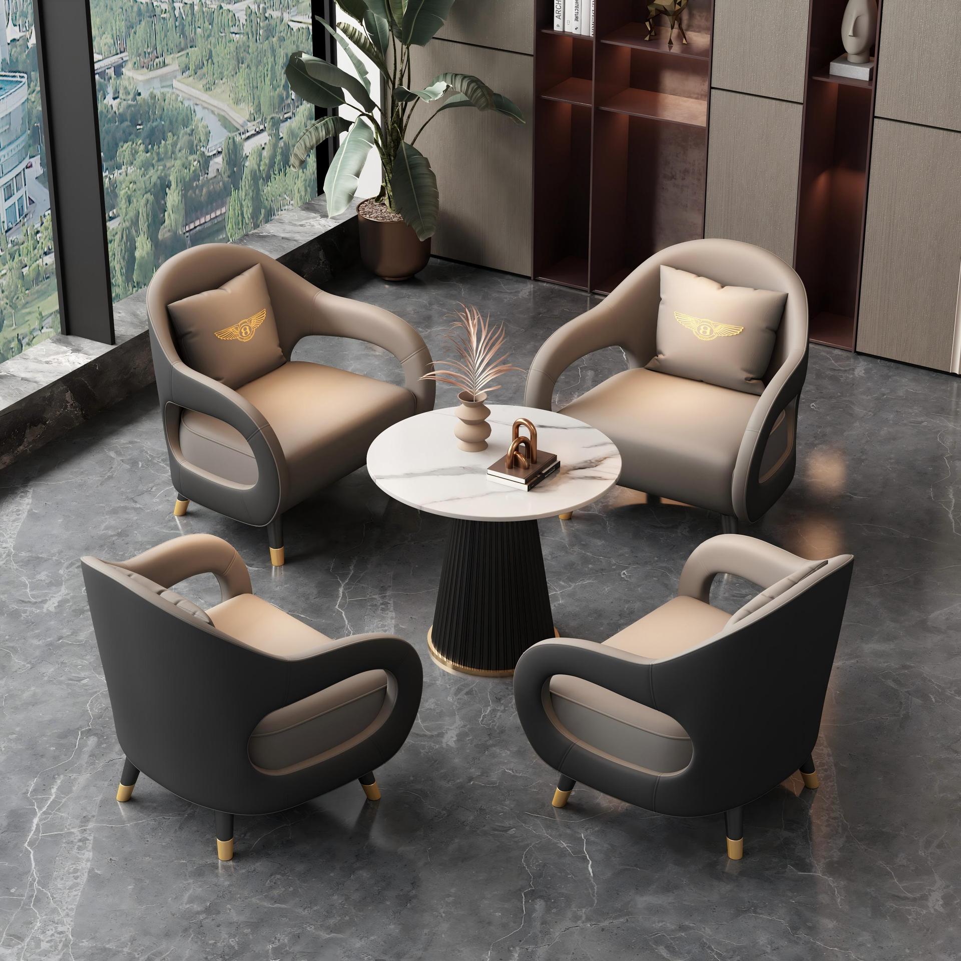 A table and four chairs (gray and black)