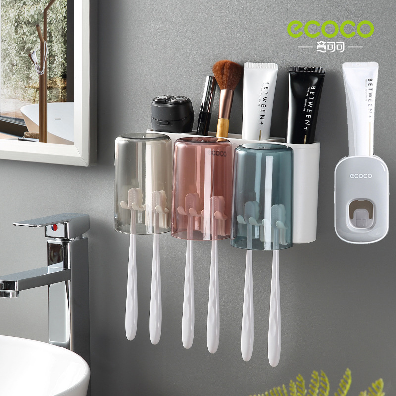 Three-cup toothpaste squeezer, gray and white