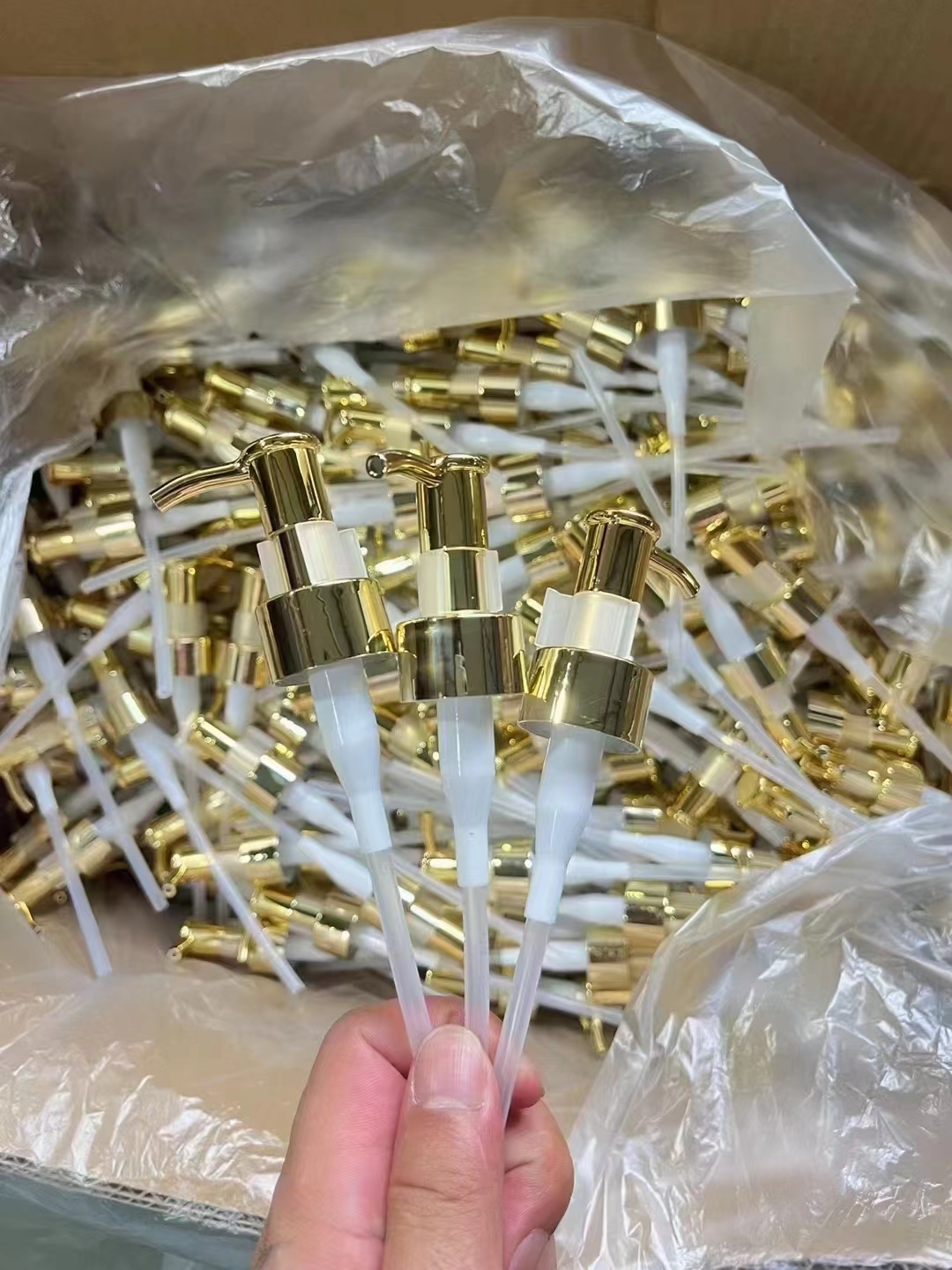 Gold insert pump cap