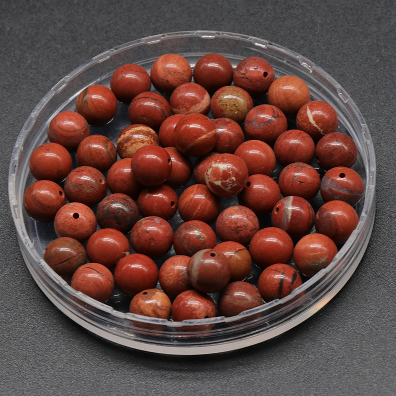 Diaspro rosso da 8 mm con mezzo foro - pezzo singolo