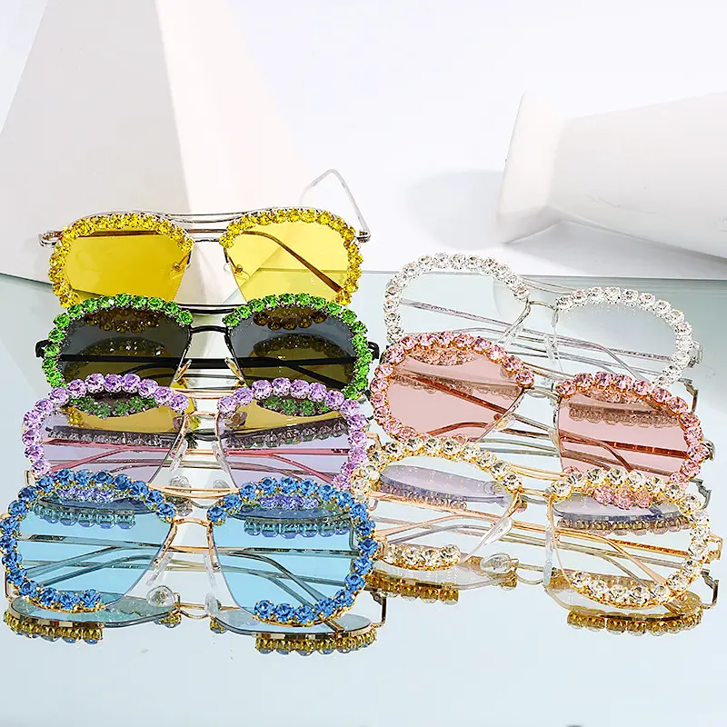 Gafas de sol de Material metálico con diamantes para mujer, lentes de sol redondas de cristal para fiesta, la más Popular