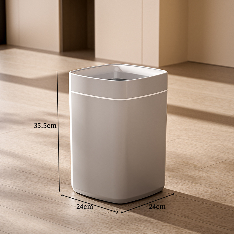 A gray large-mouth trash can
