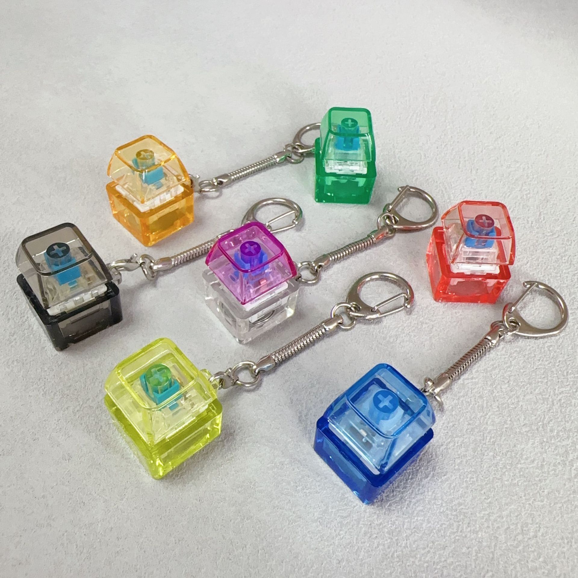 Single key transparent shell-color cap mix
