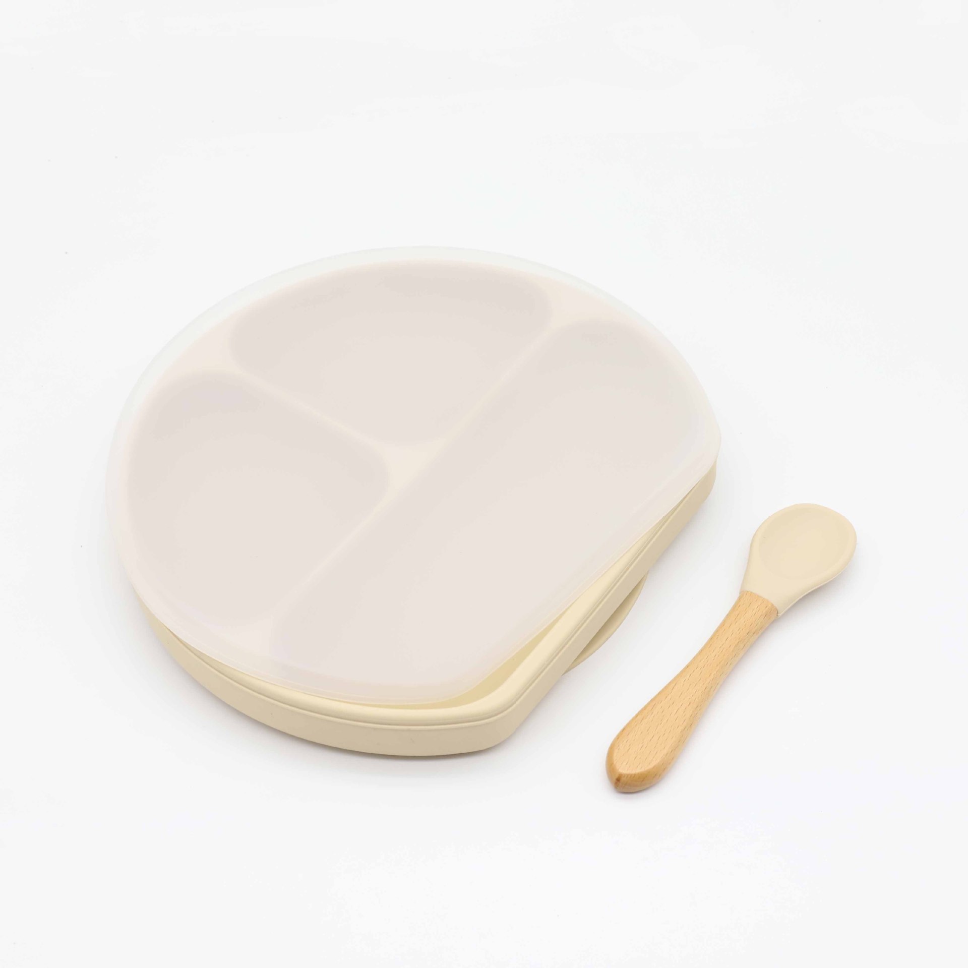 Assiette à crème avec couvercle et cuillère.