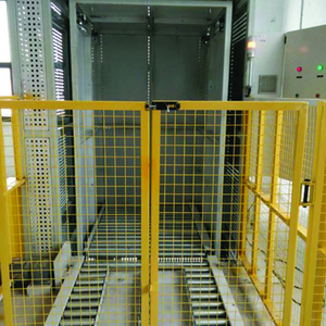 Sistema transportador de elevación continua, transportador de transferencia vertical para manejo de materiales