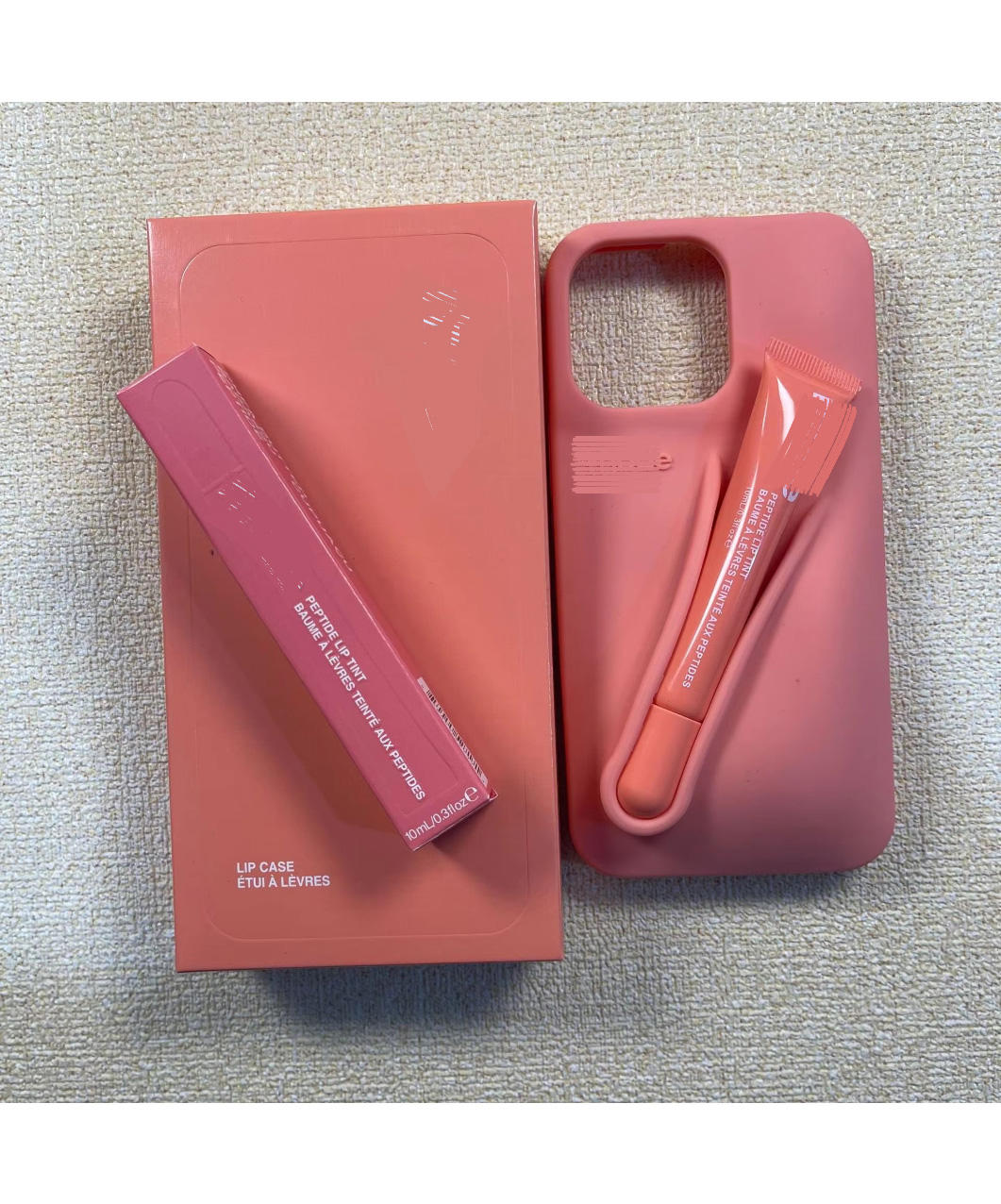 Peach Pit orange phone case + box